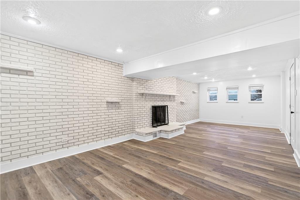 3 Park Road Charleroi, PA 15022 - Photo 28 of 43 a view of empty room with wooden floor and fireplace