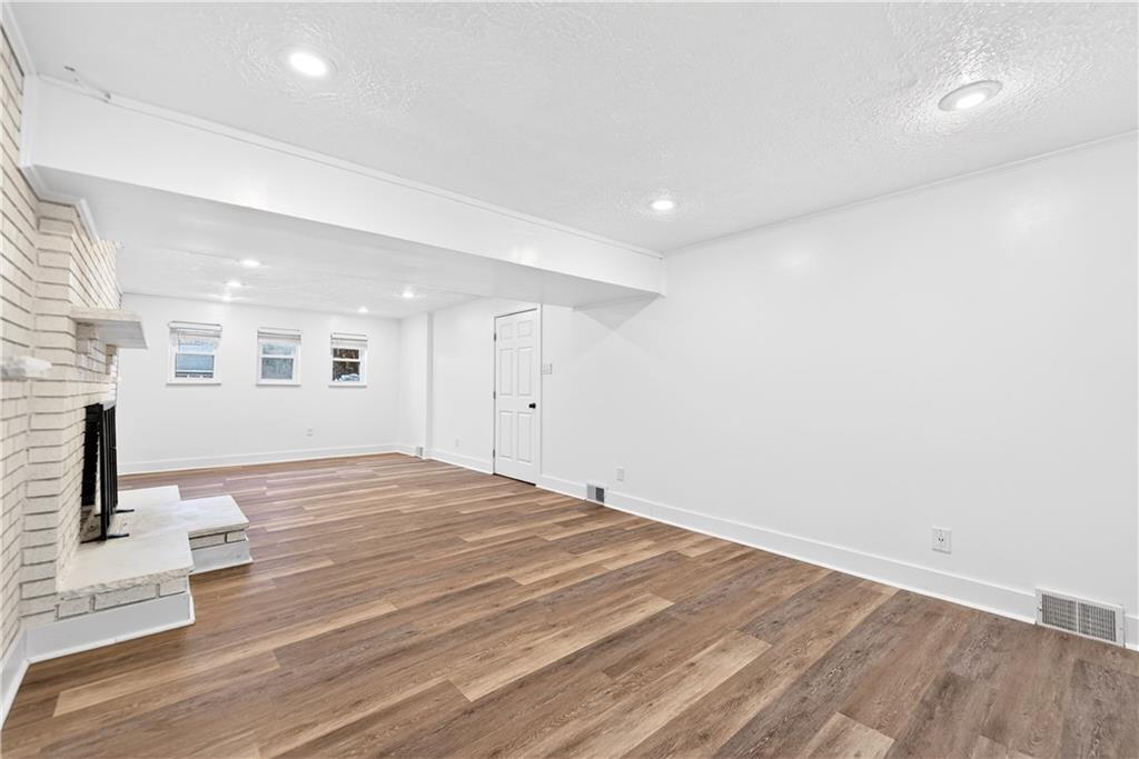 3 Park Road Charleroi, PA 15022 - Photo 32 of 43 a big room with wooden floor and bedroom view