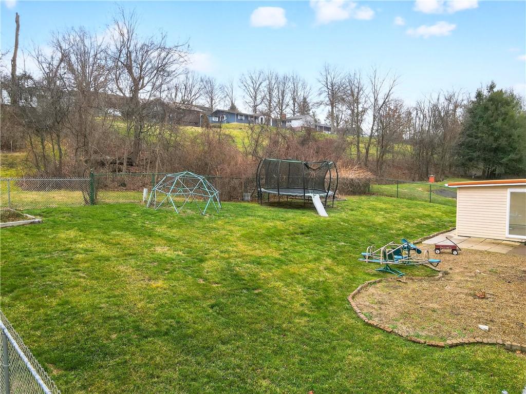 3 Park Road Charleroi, PA 15022 - Photo 37 of 43 a garden with trees in the background