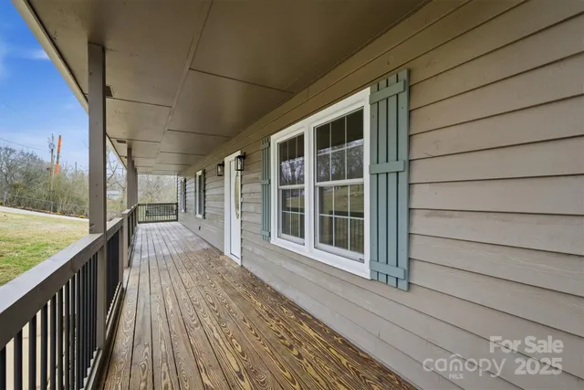 a view of a house with a large window