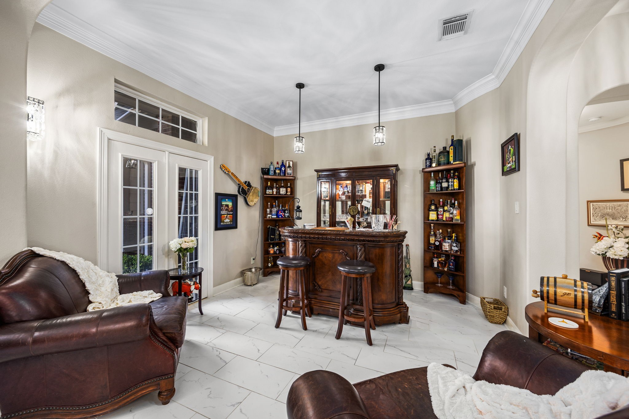11413 Gallant Ridge Lane Houston, TX 77082 - Photo 13 of 48 a living room with furniture a dining table and a chandelier