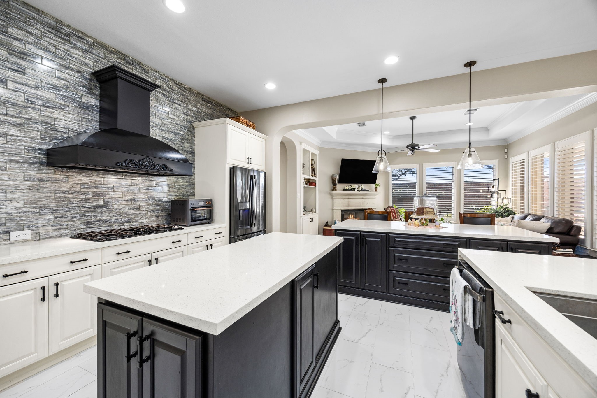11413 Gallant Ridge Lane Houston, TX 77082 - Photo 19 of 48 a kitchen with a sink a counter top space stainless steel appliances and cabinets