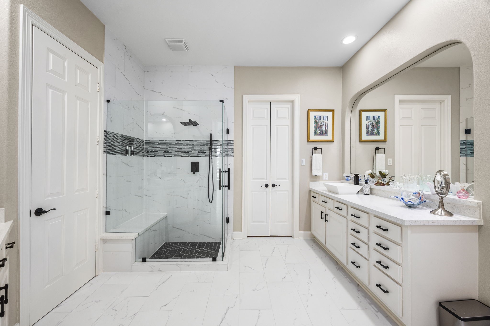 11413 Gallant Ridge Lane Houston, TX 77082 - Photo 25 of 48 a bathroom with a double vanity sink a mirror and a shower