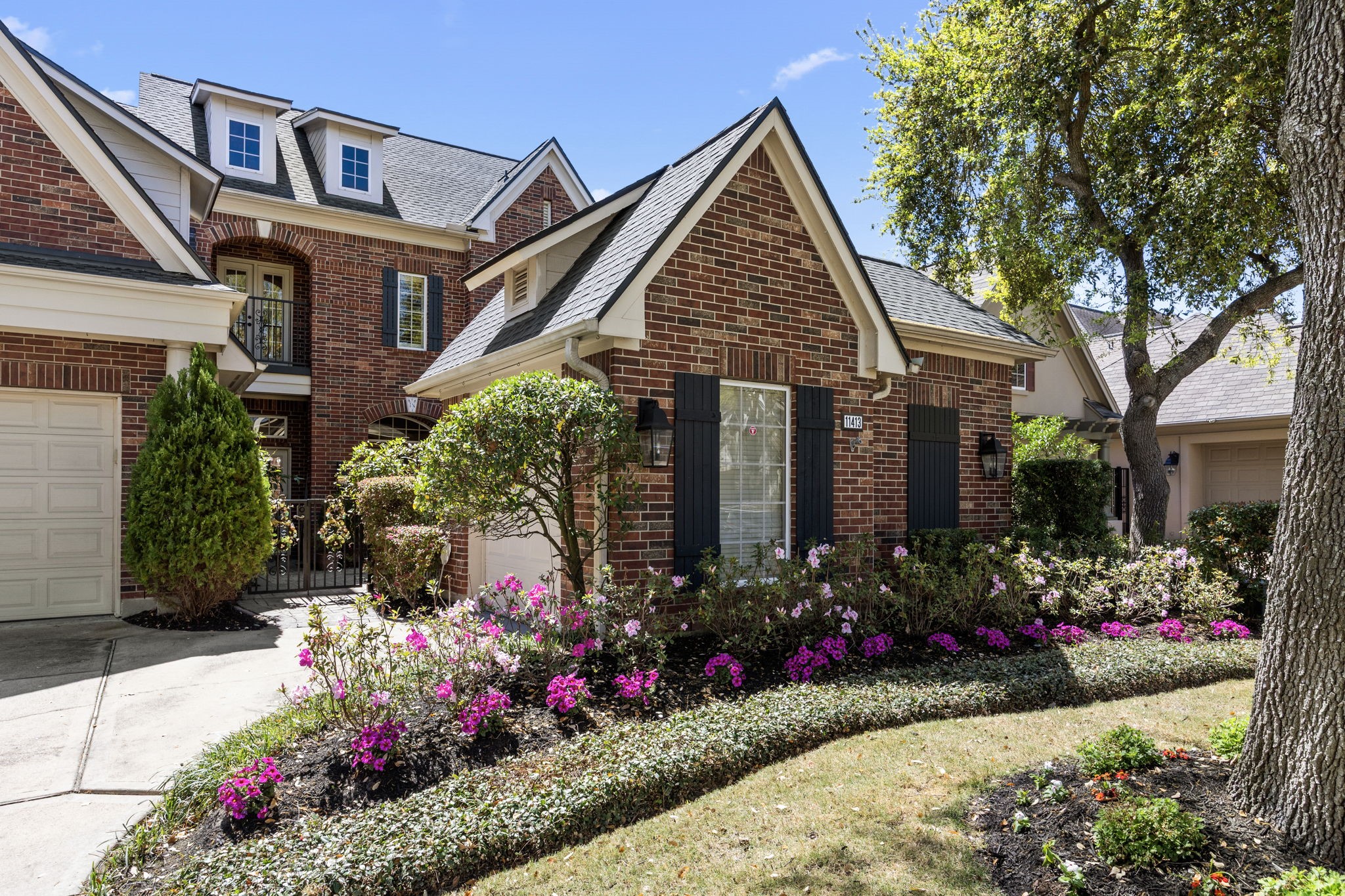 11413 Gallant Ridge Lane Houston, TX 77082 - Photo 3 of 48 a view of a house with a yard and potted plants
