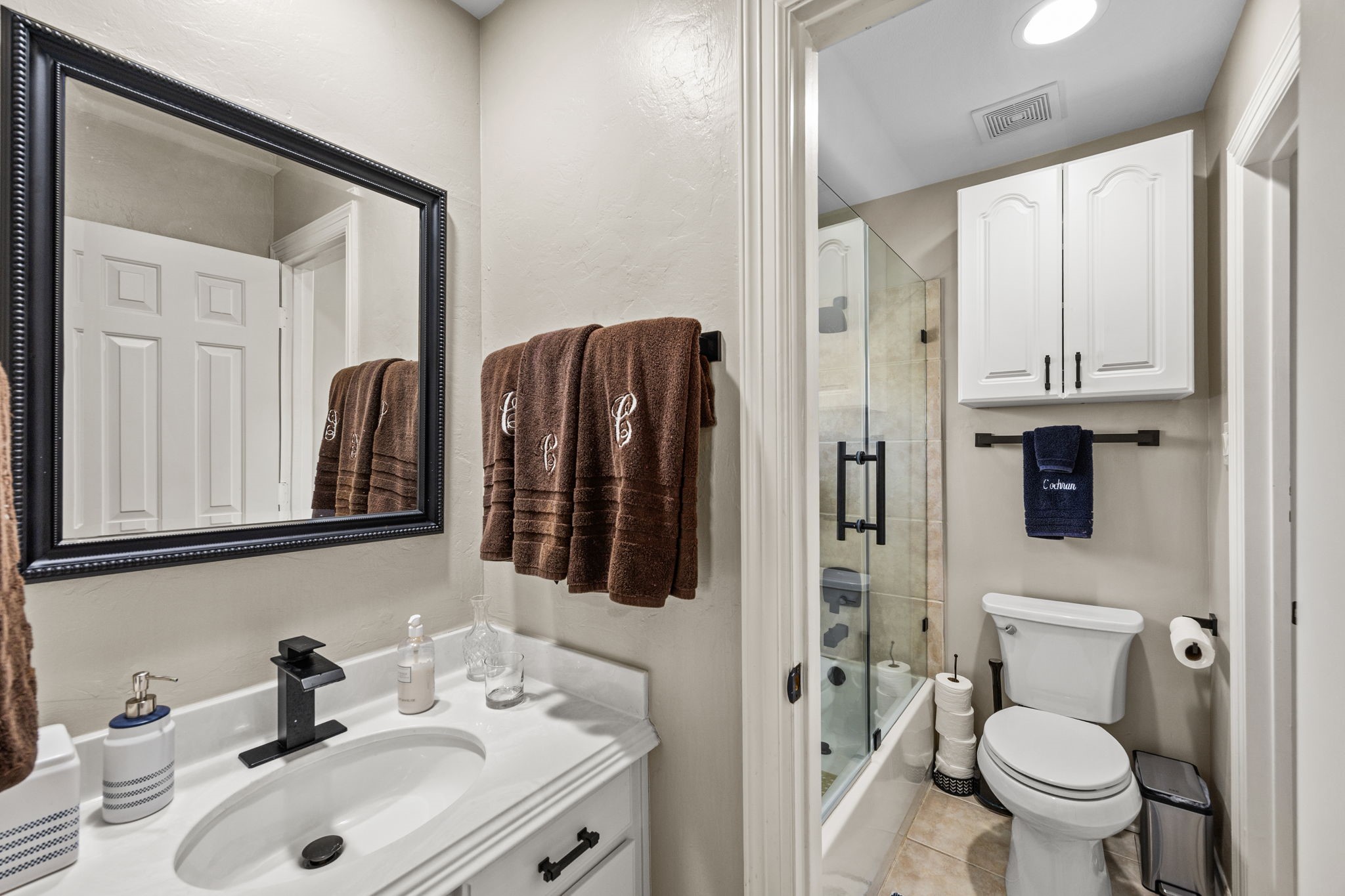 11413 Gallant Ridge Lane Houston, TX 77082 - Photo 39 of 48 a bathroom with a sink toilet and shower