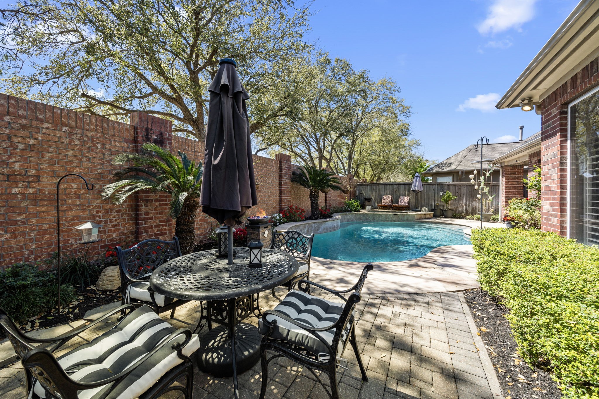 11413 Gallant Ridge Lane Houston, TX 77082 - Photo 47 of 48 a view of backyard with outdoor seating and green space