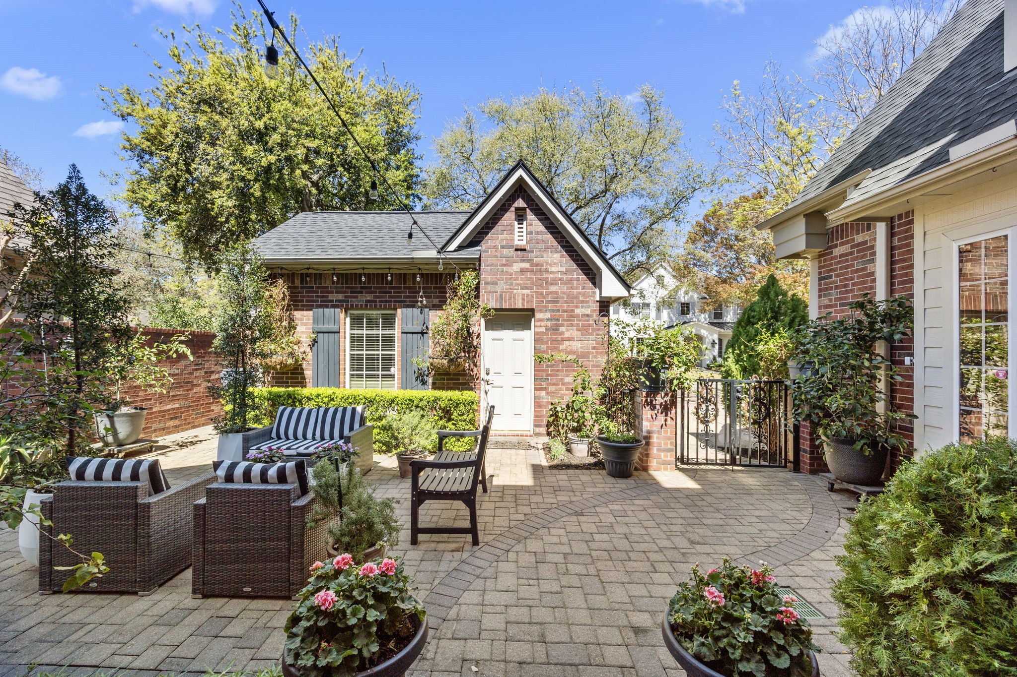 11413 Gallant Ridge Lane Houston, TX 77082 - Photo 6 of 48 a view of a patio with couches table and chairs and potted plants