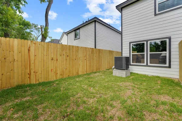 a house with trees in front of it