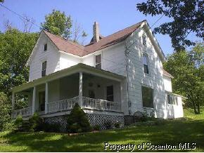 48 Franklin Hill Road Hallstead, PA 18822 - Photo 1 of 6 front view of house with a yard