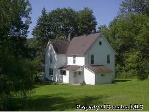 48 Franklin Hill Road Hallstead, PA 18822 - Photo 2 of 6 a view of a house with a yard