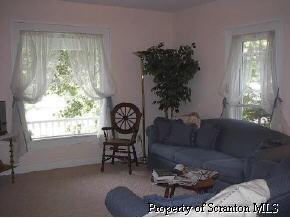 48 Franklin Hill Road Hallstead, PA 18822 - Photo 5 of 6 a living room with furniture and a large window