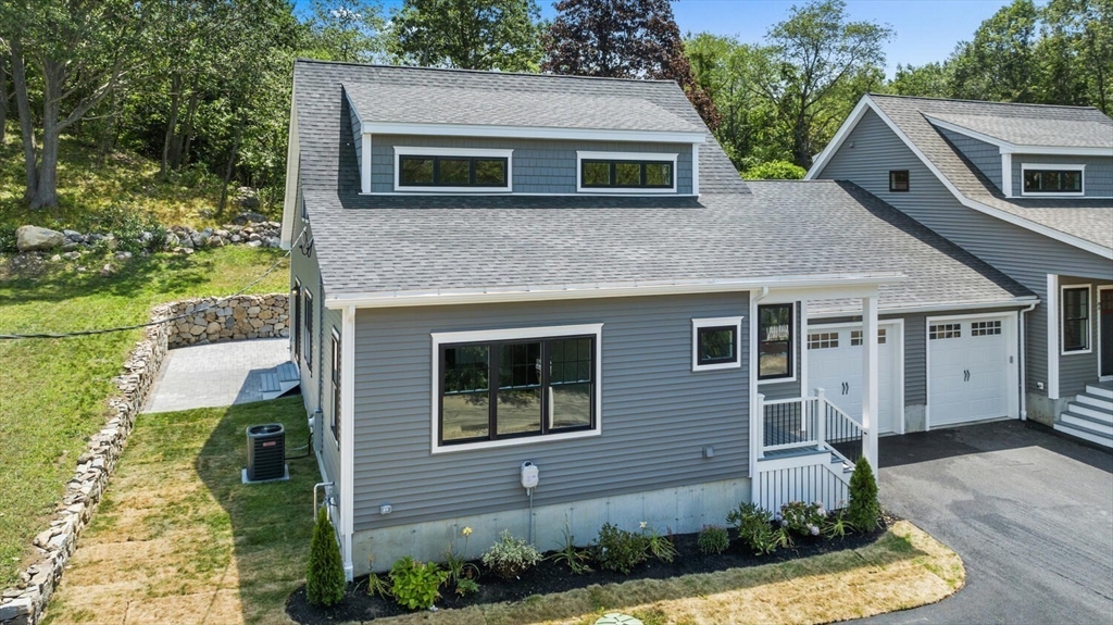 28 Riverview Road, Unit A Gloucester, MA 01930 - Photo 1 of 36 a front view of a house with garden