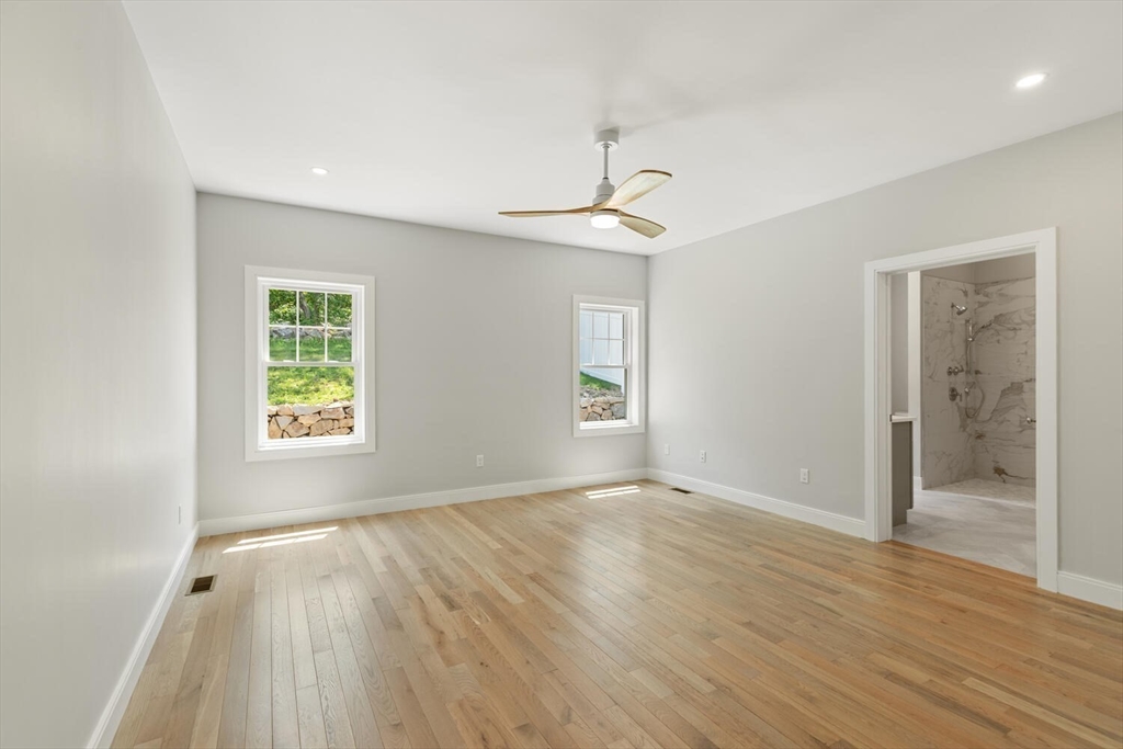 28 Riverview Road, Unit A Gloucester, MA 01930 - Photo 15 of 36 wooden floor in an empty room with a window