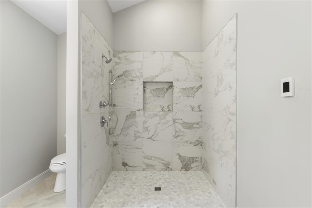 28 Riverview Road, Unit A Gloucester, MA 01930 - Photo 19 of 36 a bathroom with a shower and toilet