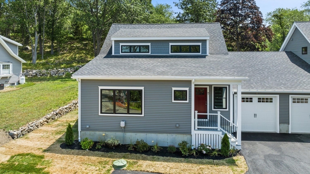 28 Riverview Road, Unit A Gloucester, MA 01930 - Photo 2 of 36 a front view of a house with garden