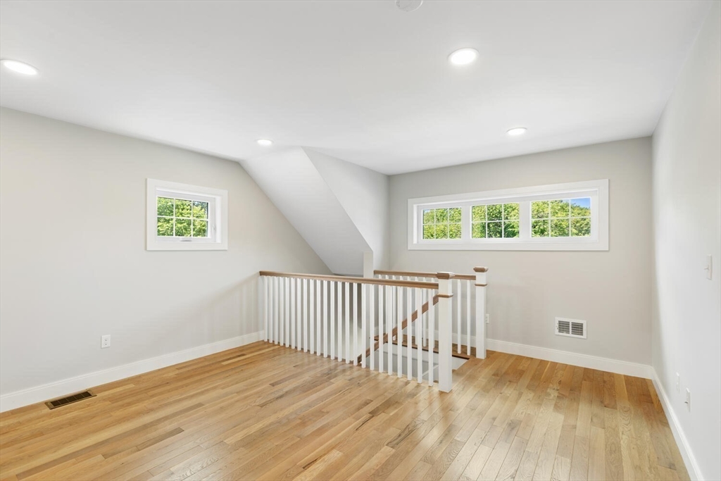 28 Riverview Road, Unit A Gloucester, MA 01930 - Photo 23 of 36 a view of a hallway with wooden floor