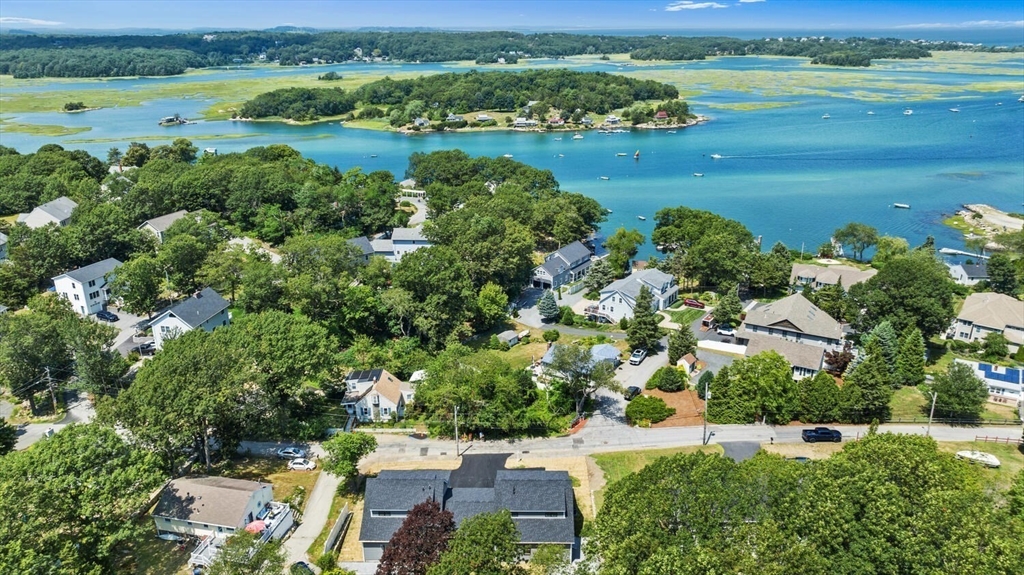 28 Riverview Road, Unit A Gloucester, MA 01930 - Photo 3 of 36 an aerial view of ocean with residential house and outdoor space