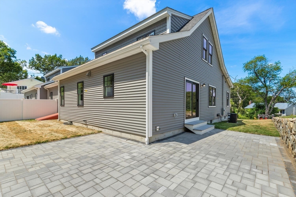 28 Riverview Road, Unit A Gloucester, MA 01930 - Photo 33 of 36 a view of backyard of the house