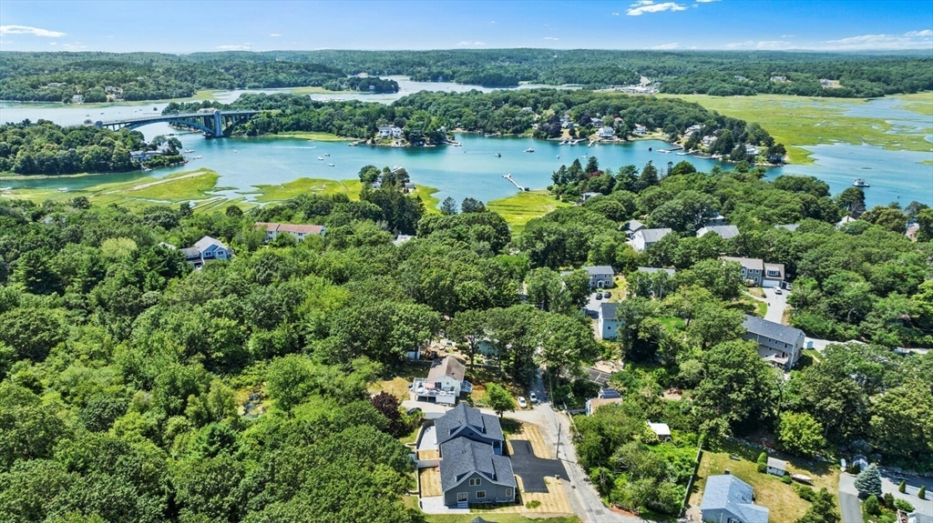 28 Riverview Road, Unit A Gloucester, MA 01930 - Photo 4 of 36 an aerial view of a houses with outdoor space and lake view
