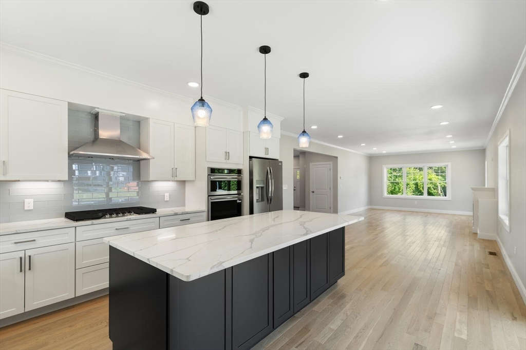 28 Riverview Road, Unit A Gloucester, MA 01930 - Photo 7 of 36 a kitchen with a sink a counter space appliances and cabinets