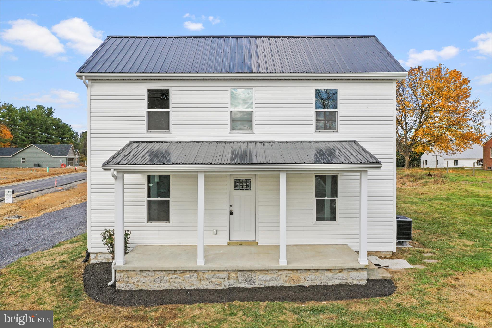 485 Bedington Road Martinsburg, WV 25404 - Photo 1 of 37 a front view of a house with a yard