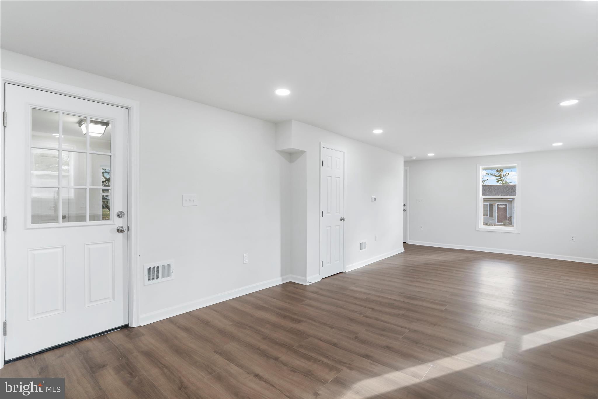 485 Bedington Road Martinsburg, WV 25404 - Photo 11 of 37 a view of an empty room with wooden floor and closet