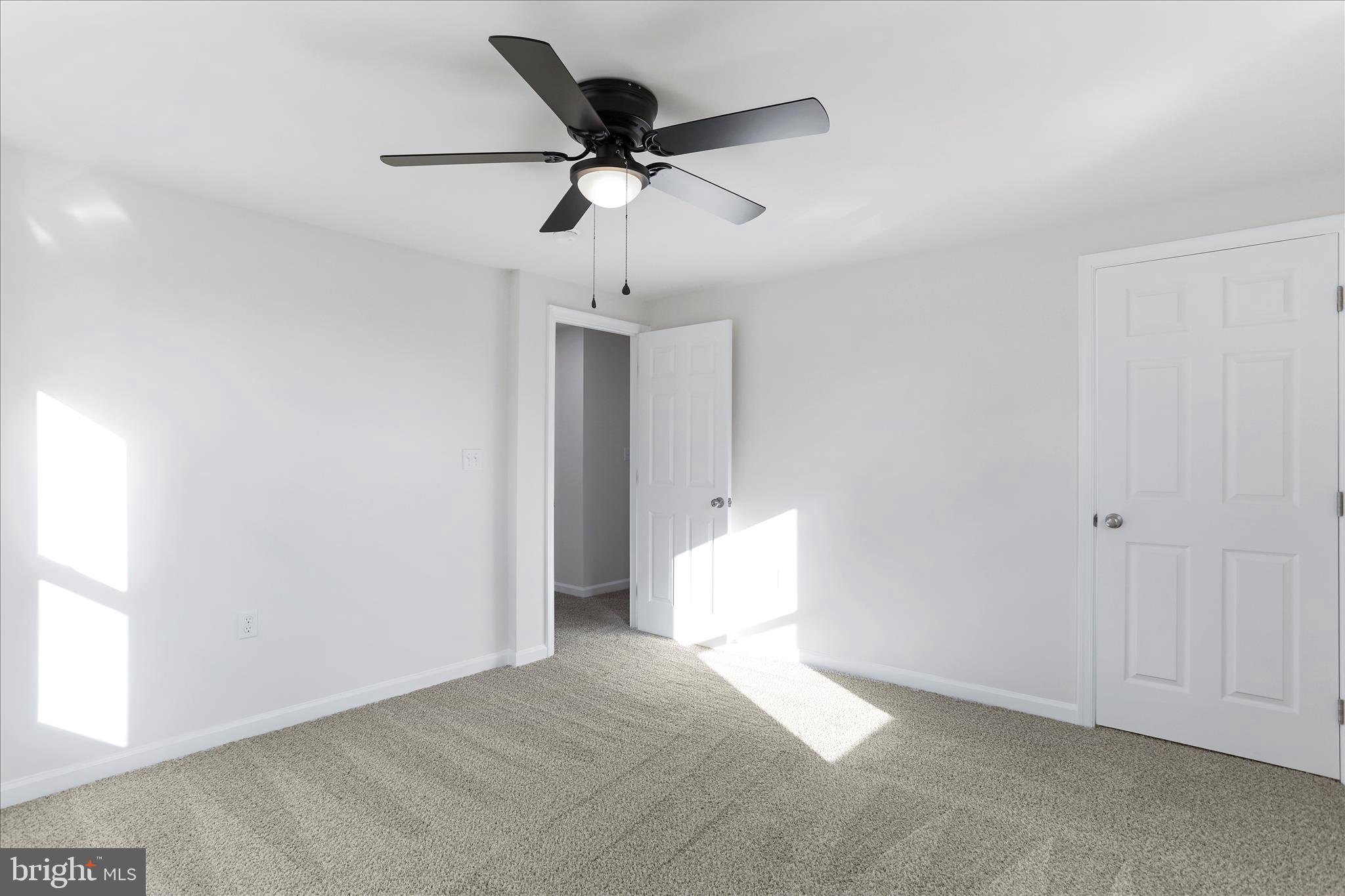 485 Bedington Road Martinsburg, WV 25404 - Photo 27 of 37 a view of room with ceiling fan and window