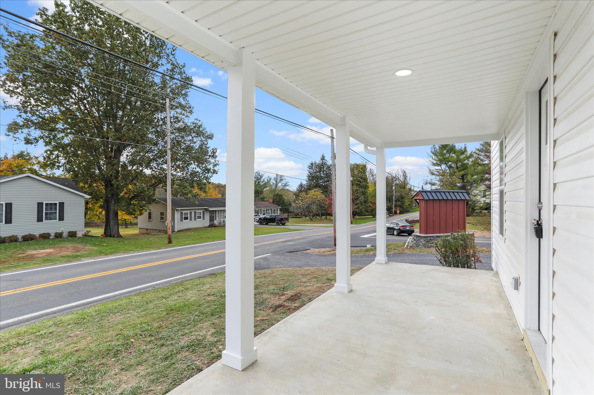 485 Bedington Road Martinsburg, WV 25404 - Photo 31 of 37 a view of a house with a backyard and a patio