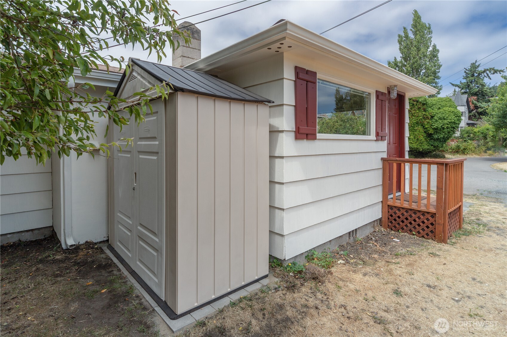 301 E Street Port Townsend, WA 98368 - Photo 4 of 19 a view of a house with a yard