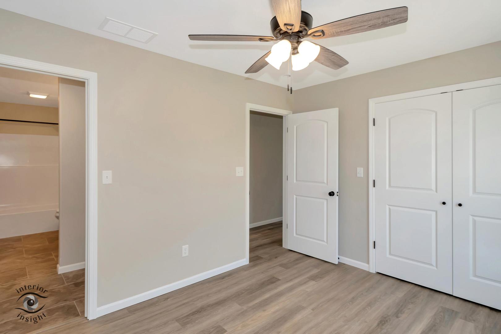 1317 Sioux Turn Kankakee, IL 60901 - Photo 21 of 35 an empty room with fan and entrance