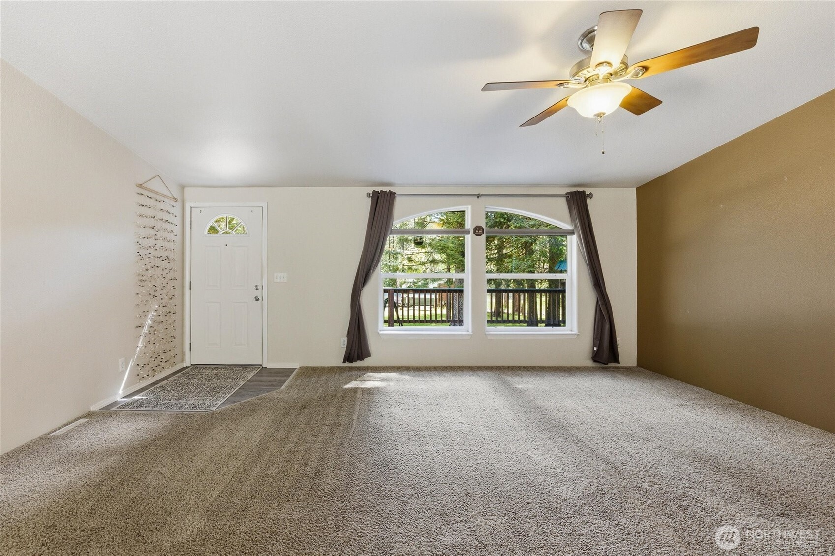 1142 Driskill Road Newport, WA 99156 - Photo 9 of 40 a view of an empty room with a window
