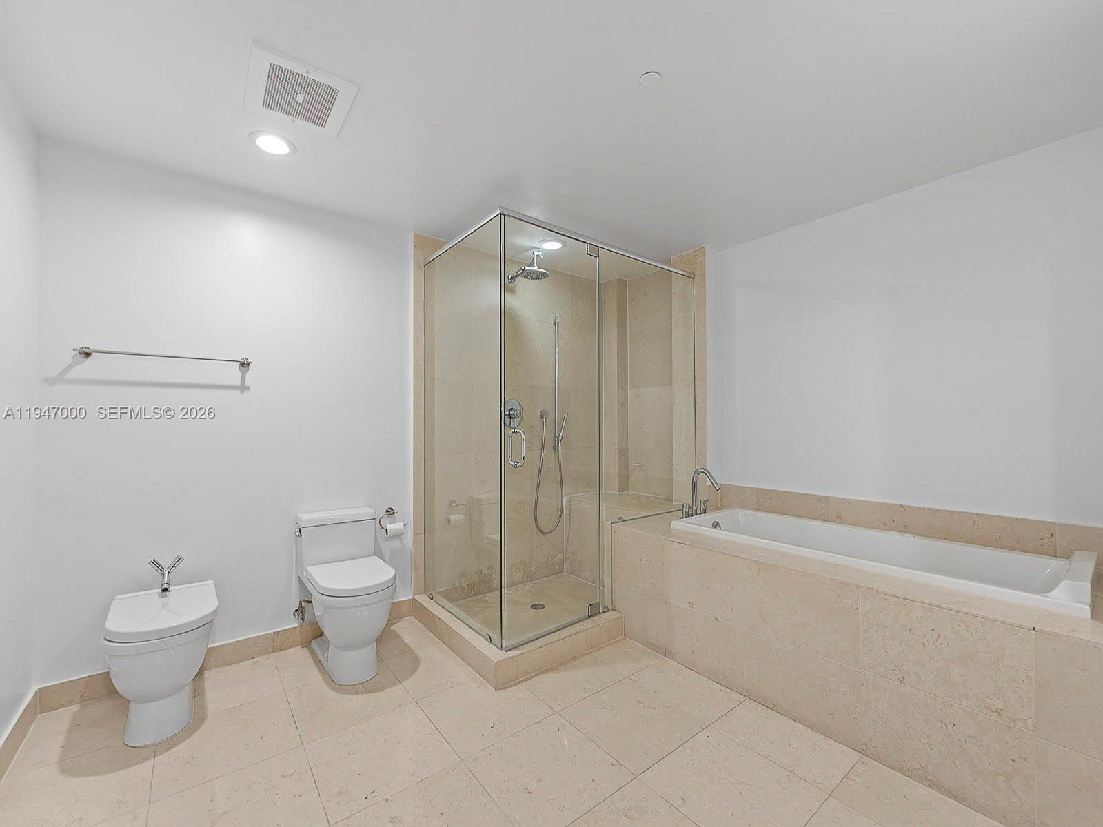 495 Brickell Avenue, Unit 1801 Miami, FL 33131 - Photo 7 of 19 a bathroom with a toilet and a shower