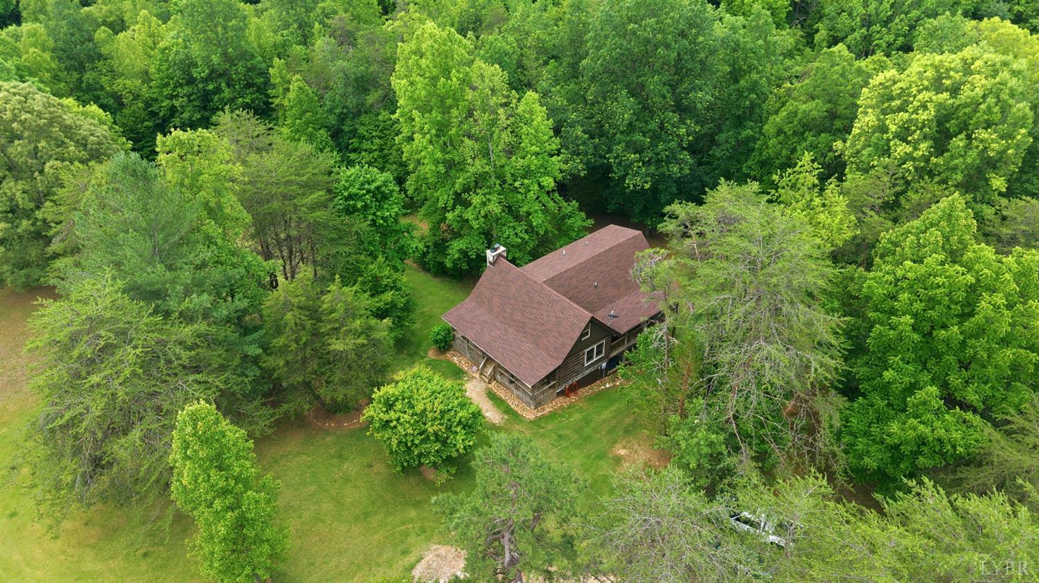 Undisclosed Address Spout Spring, VA 24593 - Photo 72 of 96 an aerial view of a house with yard outdoor and green space