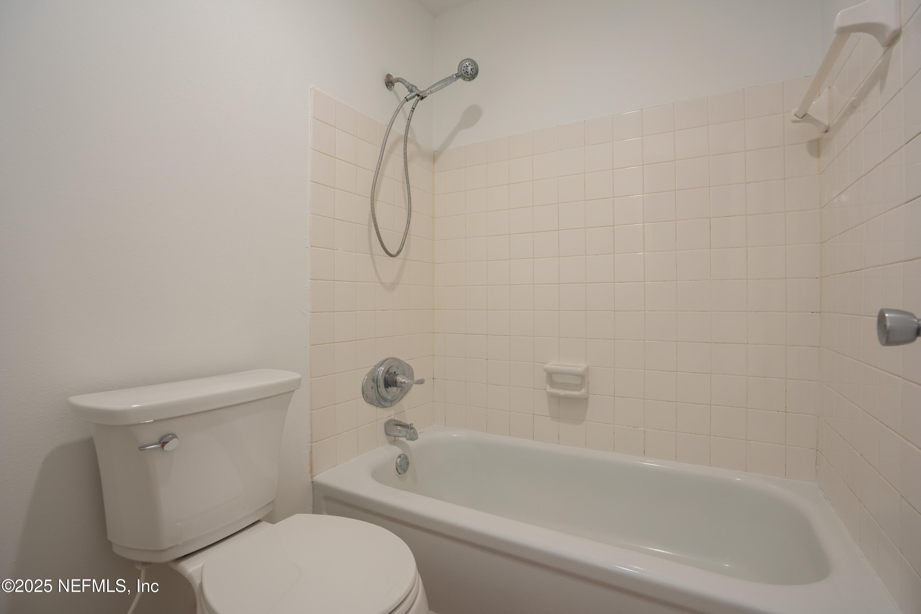 237 Marius Court St. Augustine, FL 32086 - Photo 16 of 45 a white toilet sitting next to a bath tub