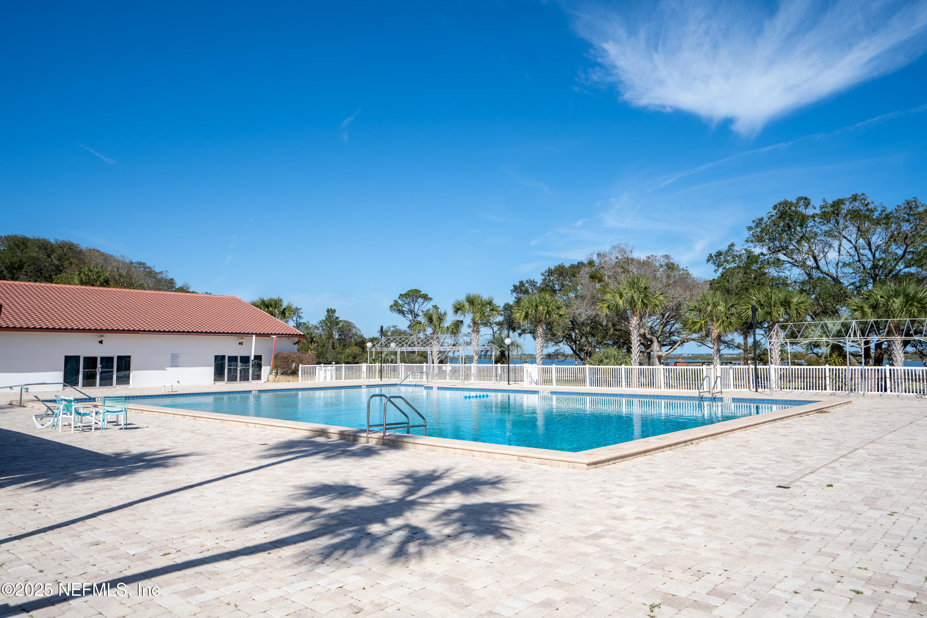 237 Marius Court St. Augustine, FL 32086 - Photo 30 of 45 a view of a swimming pool with a patio