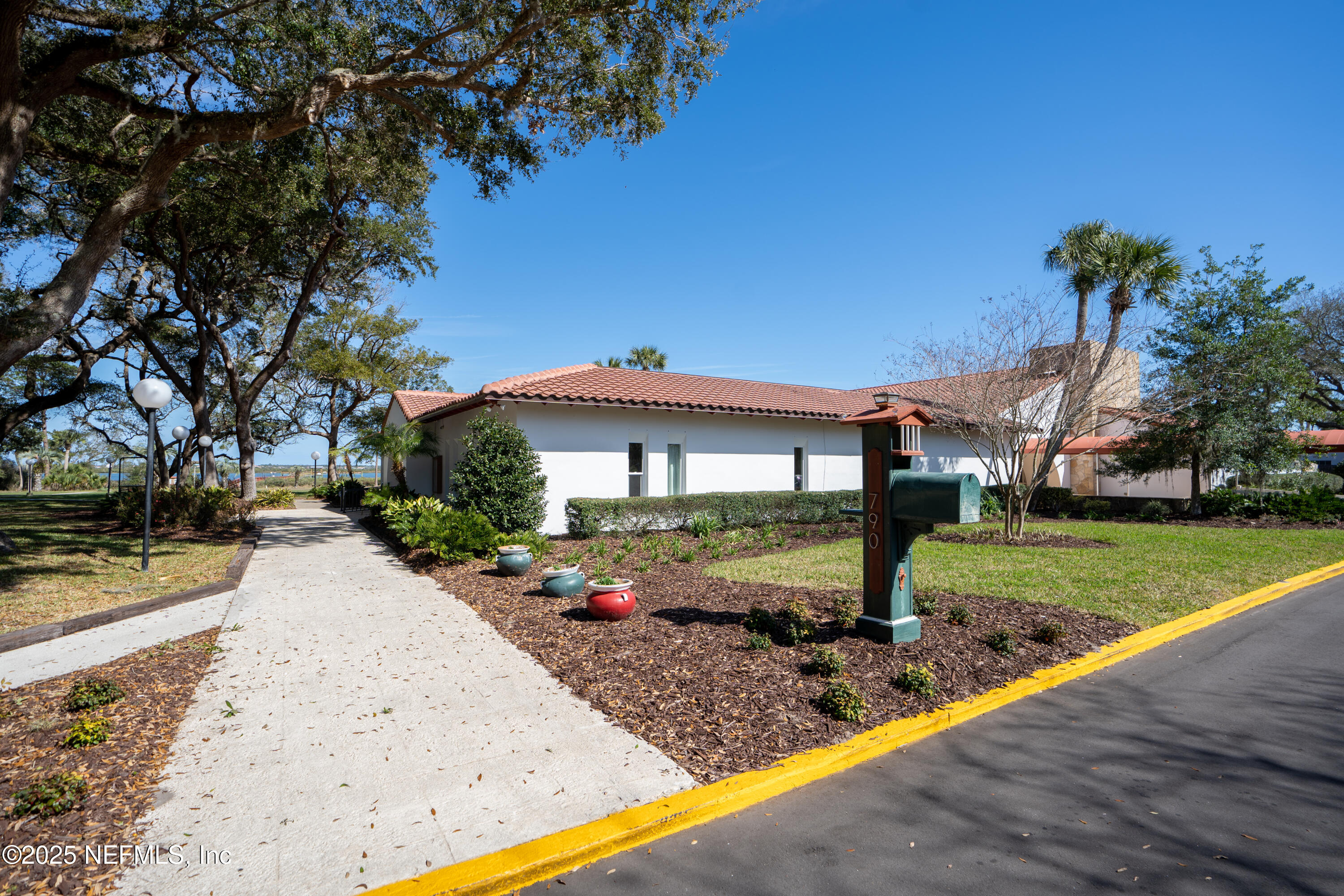 237 Marius Court St. Augustine, FL 32086 - Photo 37 of 45 a front view of a house with garden
