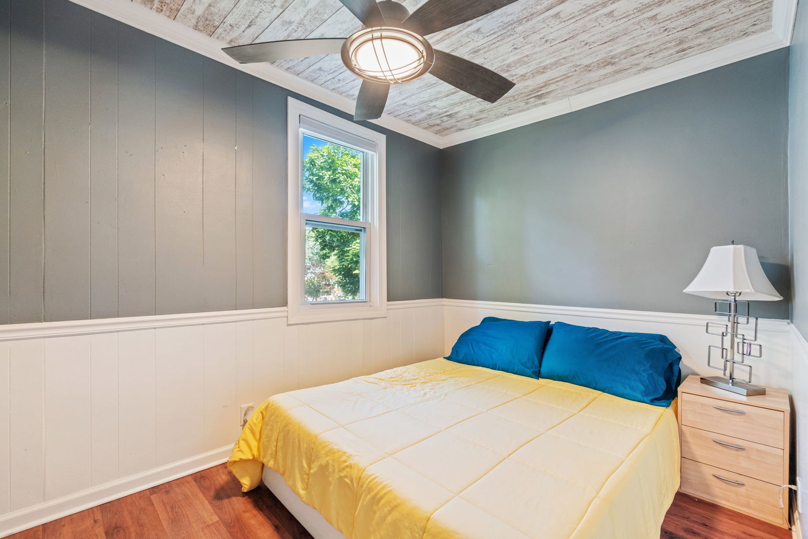 26177 West Lakeview Avenue Ingleside, IL 60041 - Photo 5 of 27 a bedroom with a bed and a window