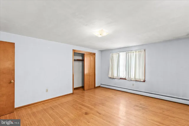 an empty room with window