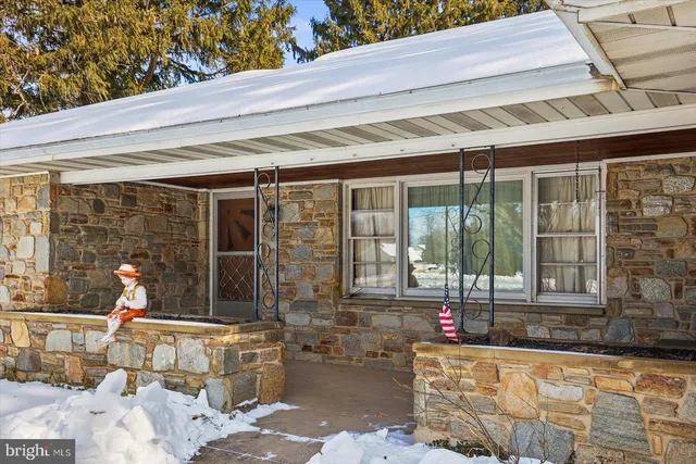 a front view of a building with glass windows