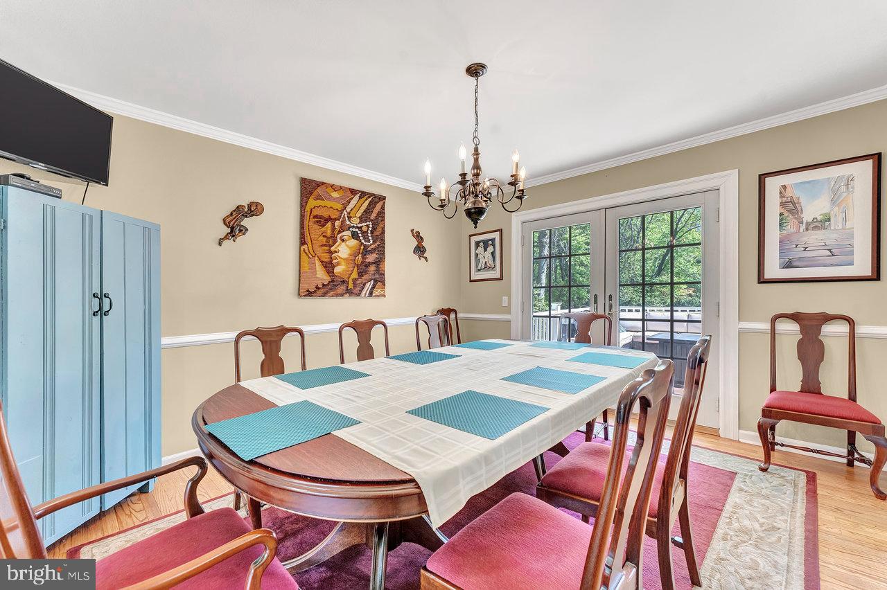 314 North Post Road Princeton Junction, NJ 08550 - Photo 8 of 24 a view of a dining room with furniture window and wooden floor