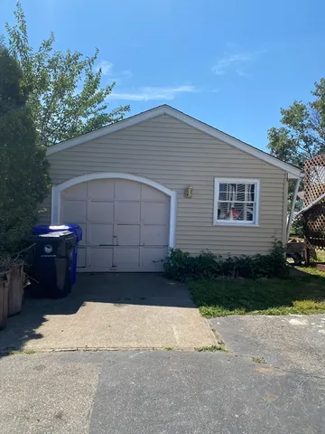 a house view with a garden space