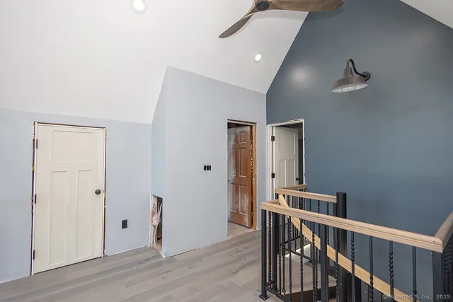 a view of entryway with wooden floor