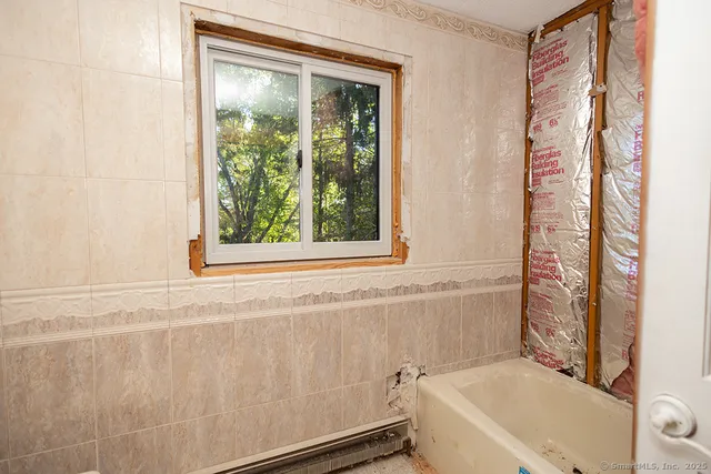 a bathroom with a sink and a bathtub