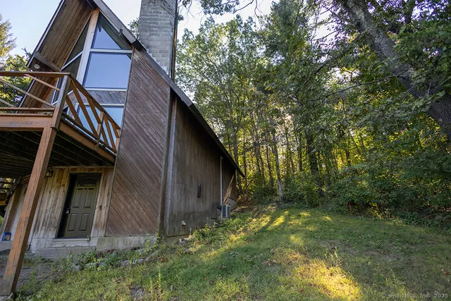 a backyard of a house with lots of green space
