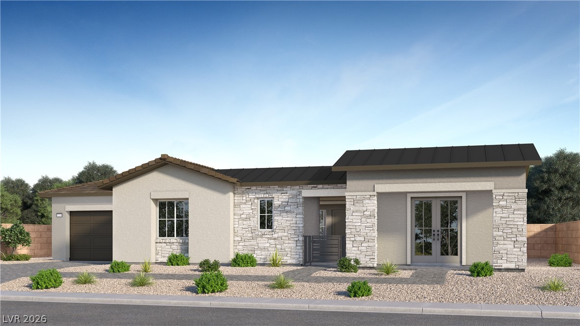 181 Sunnyvale Spring Street Las Vegas, NV 89138 - Photo 1 of 2 Modern desert architecture with a welcoming stone and stucco facade.