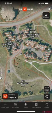 an aerial view of a house with mountain view