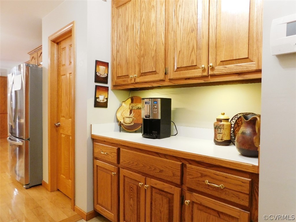 720 Putney Road Farmville, VA 23901 - Photo 6 of 33 a kitchen with a sink a refrigerator and cabinets