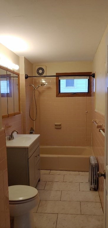 20 Wabash Avenue Worcester, MA 01604 - Photo 13 of 26 a bathroom with a sink a toilet and shower