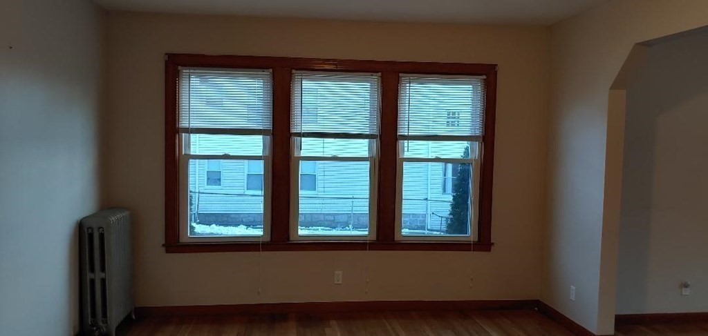 20 Wabash Avenue Worcester, MA 01604 - Photo 18 of 26 a view of an empty room with wooden floor and a window