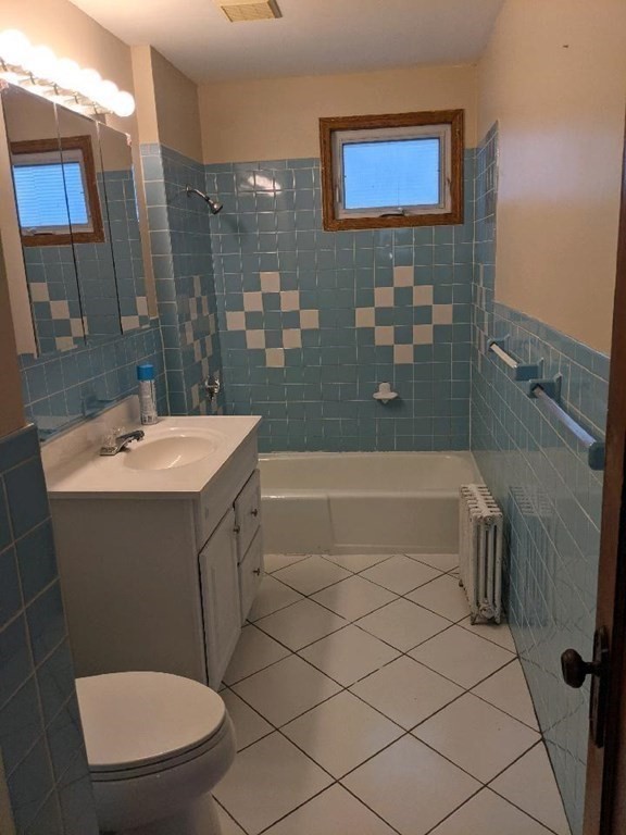 20 Wabash Avenue Worcester, MA 01604 - Photo 22 of 26 a bathroom with a sink a toilet and shower